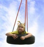 Girl on a tyre swing